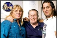 Owen Hart & Bret Hart posing with their father Stu Hart backstage