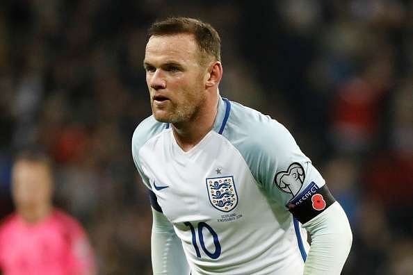 Wayne Rooney celebrates England's win over Scotland by crashing a wedding party