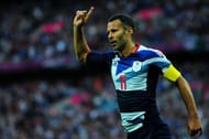 LONDON, ENGLAND - JULY 29: Ryan Giggs of Great Britain celebrates scoring the opening goal during the Men's Football first round Group A Match between Great Britain and United Arab Emirates on Day 2 of the London 2012 Olympic Games at Wembley Stadium on July 29, 2012 in London, England. (Photo by Stu Forster/Getty Images)