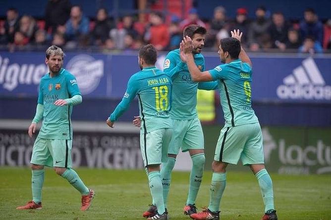 Messi, Suarez finish off Osasuna to get Barca back on track