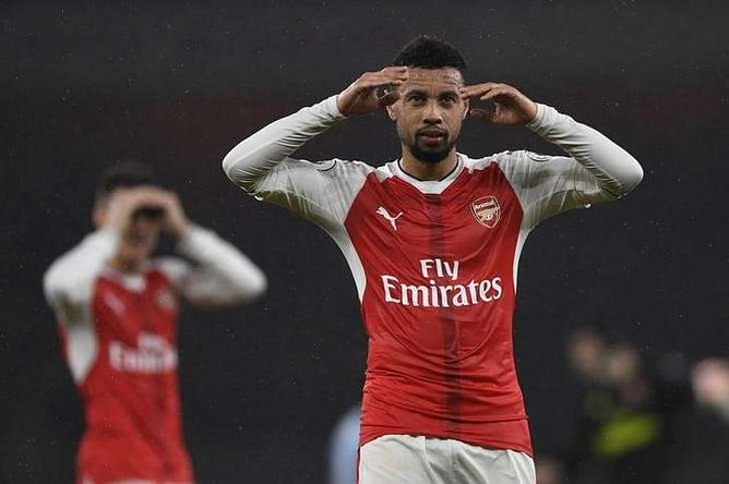 Arsenal hit back to beat Stoke and move top