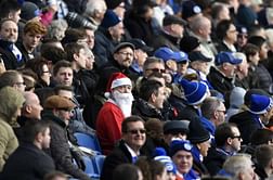 Brighton go top with 3-0 win over 10-man QPR