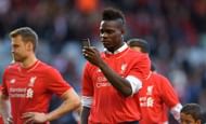 LIVERPOOL, ENGLAND - MAY 16: Mario Balotelli of Liverpool takes pictures of the fans on his phone after the Barclays Premier League match betrween Liverpool and Crystal Palace at Anfield on May 16, 2015 in Liverpool, England. (Photo by Stu Forster/Getty Images)