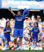 LONDON, ENGLAND - MAY 04: Frank Lampard of Chelsea and his daughters Luna and Isla appear on the pitch following the Barclays Premier League match between Chelsea and Norwich City at Stamford Bridge on May 4, 2014 in London, England. (Photo by Michael Regan/Getty Images)