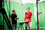 MUNICH, BAVARIA - AUGUST 10: Mats Hummels (R) is seen in a recording studio during the DFL Media Day on August, 10, 2016 in Munich, Germany. (Photo by Jan Hetfleisch/Getty Images For DFL)