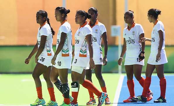 RIO DE JANEIRO, BRAZIL - AUGUST 13:  India look dejected after their 5-0 defeat which eliminates them from the Olympic Games during the Women's pool B hockey match between Argentina and India on Day 8 of the Rio 2016 Olympic Games at the Olympic Hockey Centre on August 13, 2016 in Rio de Janeiro, Brazil.  (Photo by David Rogers/Getty Images)