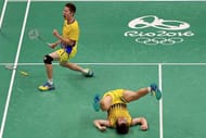 RIO DE JANEIRO, BRAZIL - AUGUST 15: V Shem Goh and Wee Kiong Tan of Malaysia celebrate winning a Mens Doubles Quarterfinal match against Yong Dae Lee and Yeon Seong Yoo of Korea on Day 10 of the 2016 Rio Olympics at Riocentro Pavillion on August 15, 2016 in Rio de Janeiro, Brazil. (Photo by Mike Ehrmann/Getty Images)