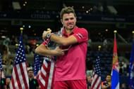 NEW YORK, NY - SEPTEMBER 11: Stan Wawrinka of Switzerland celebrates with the trophy after winning 6-7, 6-4, 7-5, 6-3 against Novak Djokovic of Serbia during their Men's Singles Final Match on Day Fourteen of the 2016 US Open at the USTA Billie Jean King National Tennis Center on September 11, 2016 in the Queens borough of New York City. (Photo by Chris Trotman/Getty Images for USTA)