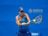 WUHAN, CHINA - SEPTEMBER 25: Belinda Bencic of Switzerland returns a shot against Svetlana Kuznetsova of Russia in a match during Day 1 of the 2016 Wuhan Open at Optics Valley International Tennis Center on September 25, 2016 in Wuhan, China. (Photo by Kevin Lee/Getty Images)