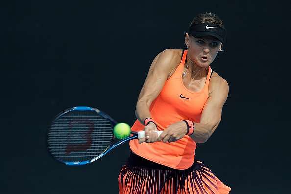 BEIJING, CHINA - OCTOBER 03:  Lucie Safarova of Czech Republic returns a shot against Karolina Pliskova of the Czech Republic  during the Women's singles second round match on day three of the 2016 China Open at the China National Tennis Centre on October 3, 2016 in Beijing, China.  (Photo by Lintao Zhang/Getty Images)