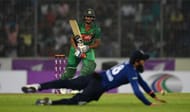 DHAKA, BANGLADESH - OCTOBER 07: Shakib Al Hasan of Bangladesh hits past Moeen Ali of England during the 1st One Day International match between Bangladesh and England at Sher-e-Bangla National Cricket Stadium on October 7, 2016 in Dhaka, Bangladesh. (Photo by Gareth Copley/Getty Images)