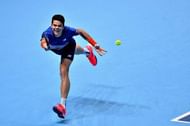 LONDON, ENGLAND - NOVEMBER 19: Milos Raonic of Canada plays a forehand shot during his men's singles semi final against Andy Murray of Great Britain on day seven of the ATP World Tour Finals at O2 Arena on November 19, 2016 in London, England. (Photo by Justin Setterfield/Getty Images)