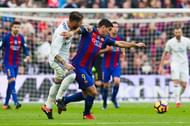 BARCELONA, SPAIN - DECEMBER 03: Luis Suarez (2nd L) of FC Barcelona and Sergio Ramos (L) of Real Madrid CF fight for the ball during the La Liga match between FC Barcelona and Real Madrid CF at Camp Nou stadium on December 3, 2016 in Barcelona, Spain. (Photo by Alex Caparros/Getty Images)