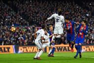 BARCELONA, SPAIN - DECEMBER 03: Luis Suarez (2nd R) of Barcelona head the ball to score the opening goal during the La Liga match between FC Barcelona and Real Madrid CF at Camp Nou on December 3, 2016 in Barcelona, Spain. (Photo by David Ramos/Getty Images)
