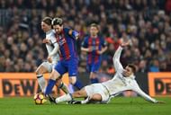 BARCELONA, SPAIN - DECEMBER 03: Lionel Messi (C) of Barcelona competes for the ball against Luka Modric (L) and Mateo Kovacic (R) of Real Madrid during the La Liga match between FC Barcelona and Real Madrid CF at Camp Nou on December 3, 2016 in Barcelona, Spain. (Photo by David Ramos/Getty Images)