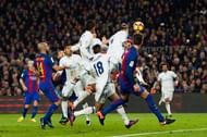BARCELONA, SPAIN - DECEMBER 03: Sergio Ramos of Real Madrid CF heads the ball towards goal and scores his team's first goal during the La Liga match between FC Barcelona and Real Madrid CF at Camp Nou stadium on December 3, 2016 in Barcelona, Spain. (Photo by Alex Caparros/Getty Images)