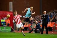 STOKE ON TRENT, ENGLAND - DECEMBER 03: Ben Mee of Burnley and Marc Muniesa of Stoke City compete for the ball during the Premier League match between Stoke City and Burnley at Bet365 Stadium on December 3, 2016 in Stoke on Trent, England. (Photo by Gareth Copley/Getty Images)