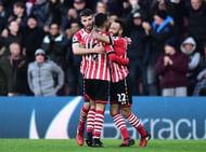 SOUTHAMPTON, ENGLAND - DECEMBER 11: Sofiane Boufal of Southampton (C) celebrates his side's first goal with Sam McQueen of Southampton (L) and Nathan Redmond of Southampton (R) during the Premier League match between Southampton and Middlesbrough at St Mary's Stadium on December 11, 2016 in Southampton, England. (Photo by Alex Broadway/Getty Images)