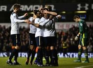 LONDON, ENGLAND - DECEMBER 14: Christian Eriksen of Tottenham Hotspur celebrates scoring his sides second goal with his Tottenham Hotspur team mates during the Premier League match between Tottenham Hotspur and Hull City at White Hart Lane on December 14, 2016 in London, England. (Photo by Dan Mullan/Getty Images)