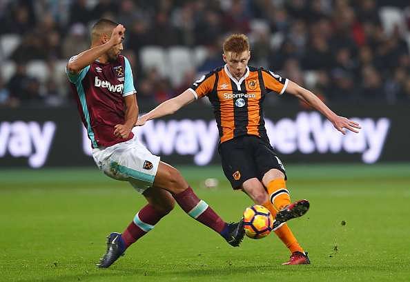 STRATFORD, ENGLAND - DECEMBER 17: Winston Reid of West Ham United (L) blocks a shot from Sam Clucas of Hull City (R) during the Premier League match between West Ham United and Hull City at London Stadium on December 17, 2016 in Stratford, England.  (Photo by Matthew Lewis/Getty Images)