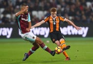 STRATFORD, ENGLAND - DECEMBER 17: Winston Reid of West Ham United (L) blocks a shot from Sam Clucas of Hull City (R) during the Premier League match between West Ham United and Hull City at London Stadium on December 17, 2016 in Stratford, England. (Photo by Matthew Lewis/Getty Images)