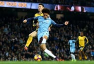 MANCHESTER, ENGLAND - DECEMBER 18: Leroy Sane of Manchester City (C) scores his sides first goal during the Premier League match between Manchester City and Arsenal at the Etihad Stadium on December 18, 2016 in Manchester, England. (Photo by Clive Brunskill/Getty Images)
