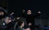 BURNLEY, ENGLAND - DECEMBER 26: A Burnley fan celebrates after Andre Gray scores the opening goal of the game during the Premier League match between Burnley and Middlesbrough at Turf Moor on December 26, 2016 in Burnley, England. (Photo by Chris Brunskill/Getty Images)