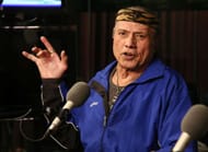 Jimmy Snuka at a media event in a wheelchair