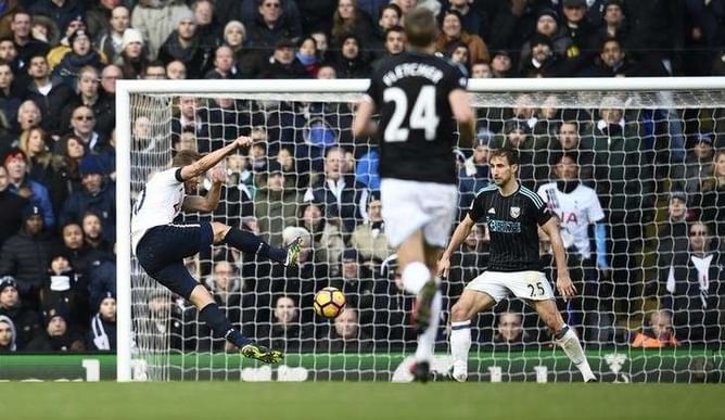 Special hat-trick for new dad Kane as Spurs win again