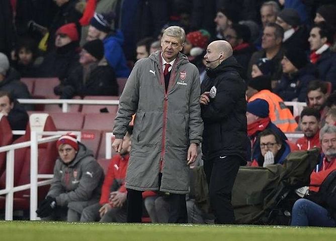 Arsenal's Wenger given four-match touchline ban