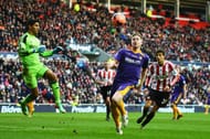 SUNDERLAND, ENGLAND - JANUARY 25: Michael Gash (R) of Kidderminster controls the ball in the box ahead of Oscar Ustari the Sunderland goalkeeper during the FA Cup Fourth Round match between Sunderland and Kidderminster Harriers at the Stadium of Light on January 25, 2014 in Sunderland, England. (Photo by Michael Regan/Getty Images)