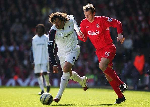 LIVERPOOL, UNITED KINGDOM - APRIL 09:  (L-R) Ivan Campo of Bolton Wanderers holds off Dietmar Hamann of Liverpool during the Barclays Premiership match between Liverpool and Bolton Wanderers at Anfield on April 9, 2006 in Liverpool, England.  (Photo by Laurence Griffiths/Getty Images)