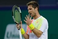 SHANGHAI, CHINA - OCTOBER 14: Mischa Zverev of Germany reacts after losing the point against Novak Djokovic of Serbia during day six of Shanghai Rolex Masters at Qi Zhong Tennis Centre on October 14, 2016 in Shanghai, China. (Photo by Lintao Zhang/Getty Images)