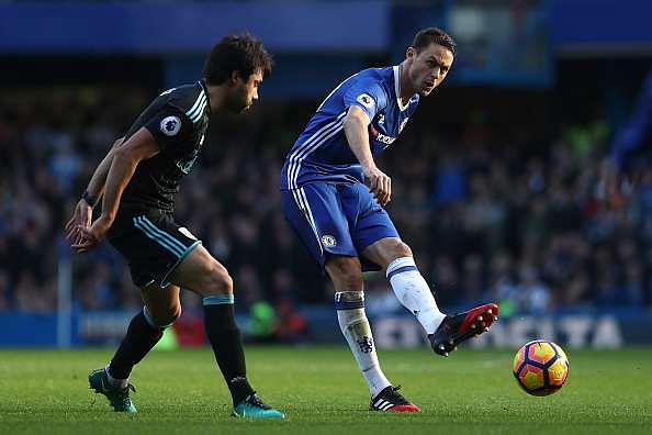 LONDON, ENGLAND - DECEMBER 11: Nemanja Matic of Chelsea and Claudio Yacob of West Bromwich Albion compete for the ball during the Premier League match between Chelsea and West Bromwich Albion at Stamford Bridge on December 11, 2016 in London, England.  (Photo by Julian Finney/Getty Images)