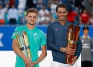 ABU DHABI, UNITED ARAB EMIRATES - DECEMBER 31: (L-R) Runner up David Goffin of Belgium and Champion Rafeal Nadal of Spain pose with their trophies after the Final match of the Mubadala World Tennis Championship at Zayed Sport City on December 31, 2016 in Abu Dhabi, United Arab Emirates. (Photo by Francois Nel/Getty Images)