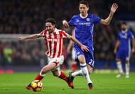 LONDON, ENGLAND - DECEMBER 31: Joe Allen of Stoke City and Nemanja Matic of Chelsea compete for the ball during the Premier League match between Chelsea and Stoke City at Stamford Bridge on December 31, 2016 in London, England. (Photo by Ian Walton/Getty Images)