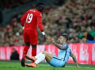 LIVERPOOL, ENGLAND - DECEMBER 31: Sadio Mane of Liverpool and Aleksander Kolorov of Manchester City clash during the Premier League match between Liverpool and Manchester City at Anfield on December 31, 2016 in Liverpool, England. (Photo by Clive Brunskill/Getty Images)