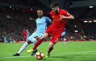 LIVERPOOL, ENGLAND - DECEMBER 31: Adam Lallana of Liverpool and Fernandinho of Manchester City in action during the Premier League match between Liverpool and Manchester City at Anfield on December 31, 2016 in Liverpool, England. (Photo by Clive Brunskill/Getty Images)