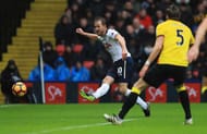 WATFORD, ENGLAND - JANUARY 01: Harry Kane of Tottenham Hotspur (10) scores their first goal during the Premier League match between Watford and Tottenham Hotspur at Vicarage Road on January 1, 2017 in Watford, England. (Photo by Richard Heathcote/Getty Images)