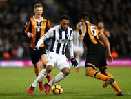WEST BROMWICH, ENGLAND - JANUARY 02: Matt Phillips of West Bromwich Albion (C) attempts to take the ball past Curtis Davies of Hull City (R) during the Premier League match between West Bromwich Albion and Hull City at The Hawthorns on January 2, 2017 in West Bromwich, England. (Photo by Julian Finney/Getty Images)