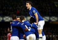 LIVERPOOL, ENGLAND - JANUARY 02: Leighton Baines of Everton is mobbed by team mates including Seamus Coleman (top) after scoring his team's second goal during the Premier League match between Everton and Southampton at Goodison Park on January 2, 2017 in Liverpool, England. (Photo by Clive Brunskill/Getty Images)