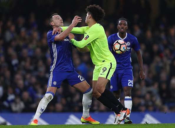 LONDON, ENGLAND - JANUARY 08: John Terry of Chelsea (L) and ch9 (R) confront each other during The Emirates FA Cup Third Round match between Chelsea and Peterborough United at Stamford Bridge on January 8, 2017 in London, England.  (Photo by Ian Walton/Getty Images)