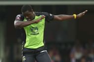 SYDNEY, AUSTRALIA - JANUARY 14: Carlos Brathwaite of the Thunder dabs as he celebrates taking the wicket of Brad Haddin of the Sixers during the Big Bash League match between the Sydney Sixers and the Sydney Thunder at Sydney Cricket Ground on January 14, 2017 in Sydney, Australia. (Photo by Mark Kolbe/Getty Images)