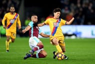 LONDON, ENGLAND - JANUARY 14: Winston Reid of West Ham United (L) tackles Chung-yong Lee of Crystal Palace (R) during the Premier League match between West Ham United and Crystal Palace at London Stadium on January 14, 2017 in London, England. (Photo by Shaun Botterill/Getty Images)