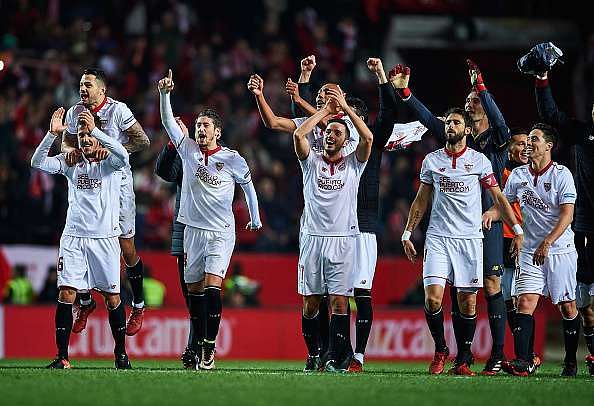 SEVILLE, SPAIN - JANUARY 15:  (L-R) Adil Rami, Victor Machin Perez &#039;Vitolo&#039;,  Stevan Jovetic and Sergio Escudero of Sevilla FC celebrates after winning the match against Real Madrid CF during the La Liga match between Sevilla FC and Real Madrid CF at Estadio Ramon Sanchez Pizjuan on January 15, 2017 in Seville, Spain.  (Photo by Aitor Alcalde/Getty Images)