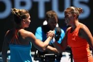 MELBOURNE, AUSTRALIA - JANUARY 16: Shelby Rogers of the United States and Simona Halep of Romania shake hands after Rogers won their first round match on day one of the 2017 Australian Open at Melbourne Park on January 16, 2017 in Melbourne, Australia. (Photo by Clive Brunskill/Getty Images)
