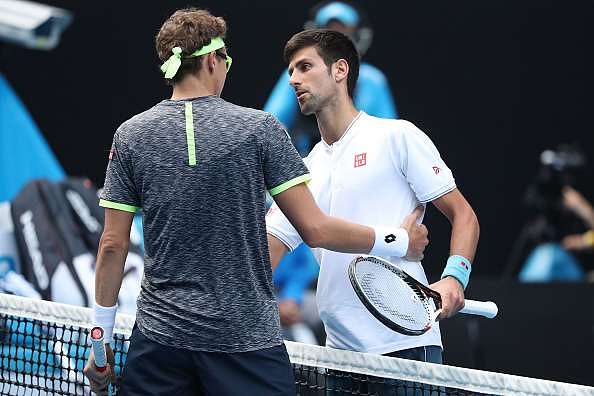 MELBOURNE, AUSTRALIA - JANUARY 19:  Novak Djokovic of Serbia congratulates Denis Istomin of Uzbekistan after winning their second round match on day four of the 2017 Australian Open at Melbourne Park on January 19, 2017 in Melbourne, Australia.  (Photo by Scott Barbour/Getty Images)
