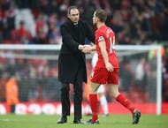 LIVERPOOL, ENGLAND - JANUARY 21: Paul Clement, Manager of Swansea City (L) shakes hands with Jordan Henderson of Liverpool (R) after the Premier League match between Liverpool and Swansea City at Anfield on January 21, 2017 in Liverpool, England. (Photo by Julian Finney/Getty Images)