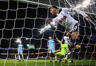 MANCHESTER, ENGLAND - JANUARY 21: Dele Alli of Tottenham Hotspur celebrates scoring his sides first goal during the Premier League match between Manchester City and Tottenham Hotspur at Etihad Stadium on January 21, 2017 in Manchester, England. (Photo by Clive Mason/Getty Images)