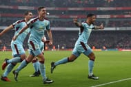 LONDON, ENGLAND - JANUARY 22: Andre Gray (R) of Burnley celebrates scoring his team's first goal from the penalty spot during the Premier League match between Arsenal and Burnley at the Emirates Stadium on January 22, 2017 in London, England. (Photo by Julian Finney/Getty Images)